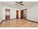 Spacious bedroom with hardwood floors and a ceiling fan at 521 Harrison St, Denver, CO 80206