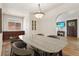 Light and bright dining room featuring modern lighting and hardwood floors at 521 Harrison St, Denver, CO 80206
