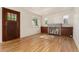 Living room featuring a fireplace, hardwood floors, and natural light from the front windows at 521 Harrison St, Denver, CO 80206