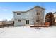 Two-story house with deck and fenced backyard at 4072 S Kirk Way, Aurora, CO 80013