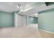 Neutral-toned basement with carpeted floor and storage at 4072 S Kirk Way, Aurora, CO 80013