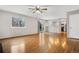 Hardwood floor living room with sliding door to access outside at 4072 S Kirk Way, Aurora, CO 80013