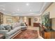Spacious finished basement with comfortable seating, media center and ample lighting at 10182 Bristleridge St, Parker, CO 80134