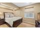 Bedroom featuring a bed, a window and neutral tones at 10182 Bristleridge St, Parker, CO 80134