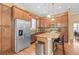Well-equipped kitchen with stainless steel appliances, granite countertops, and ample cabinet space at 10182 Bristleridge St, Parker, CO 80134