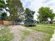 Charming single-story home with mature trees and a spacious front yard at 10025 W 8Th Ave, Lakewood, CO 80215