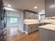 Well-lit kitchen with modern appliances and plenty of counter space for food preparation at 10025 W 8Th Ave, Lakewood, CO 80215