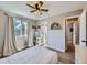 Comfortable bedroom with access to a shared bathroom at 4737 N Bearlily Way, Castle Rock, CO 80109