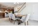 Inviting dining room next to the kitchen with modern table and chairs at 7367 S Pennsylvania St, Littleton, CO 80122