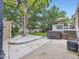 Relax in this landscaped backyard featuring a hot tub, patio, deck, and space for entertainment at 9150 Garrison St, Broomfield, CO 80021