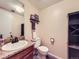 Bathroom featuring a granite countertop and a toilet at 9150 Garrison St, Broomfield, CO 80021