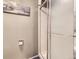 Bathroom showcasing a glass shower with white tile and silver fixtures, creating a clean and modern aesthetic at 9150 Garrison St, Broomfield, CO 80021
