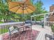 Outdoor dining set and decor on a spacious deck, perfect for enjoying outdoor meals at 9150 Garrison St, Broomfield, CO 80021