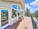 Inviting outdoor deck with comfortable seating and stunning views, ideal for relaxation and entertaining guests at 22155 Cook Ln, Morrison, CO 80465