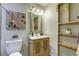 Modern bathroom with updated vanity, toilet, and shower at 3813 E 121St Ave, Thornton, CO 80241