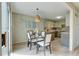 Dining area with glass table and access to the kitchen at 3813 E 121St Ave, Thornton, CO 80241