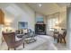 Bright living room with hardwood floors and fireplace at 3813 E 121St Ave, Thornton, CO 80241