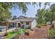 Large backyard with patio, hot tub, and garden at 6403 Zang Ct, Arvada, CO 80004