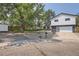 Ranch style home with landscaped yard and attached garage at 6403 Zang Ct, Arvada, CO 80004