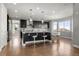 Modern kitchen with a large island and seating at 7606 S Valleyhead Ct, Aurora, CO 80016