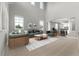 Bright living room with high ceilings and large windows at 7606 S Valleyhead Ct, Aurora, CO 80016