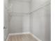 Walk-in closet with carpet and metal shelving at 7606 S Valleyhead Ct, Aurora, CO 80016