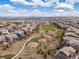 Community aerial view showcasing the neighborhood layout, green spaces, and nearby residential areas at 14710 Domino Dr, Parker, CO 80134