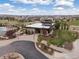 Aerial view of the community center with surrounding green spaces, walking paths, and recreational amenities at 14710 Domino Dr, Parker, CO 80134