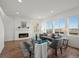 Comfortable living room with fireplace, large windows, and stylish decor at 14710 Domino Dr, Parker, CO 80134