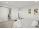 Spacious main bedroom featuring a walk-in closet, modern decor, and ample lighting at 14710 Domino Dr, Parker, CO 80134