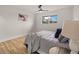 Bedroom featuring recessed lights, a ceiling fan, a window and sleek hardwood floors at 9230 Aspen Dr, Thornton, CO 80229