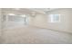 Finished basement with plush carpet, recessed lighting, and natural light from windows at 6207 E 155Th Pl, Brighton, CO 80602