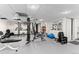 Well-equipped gym featuring weights, machines, and mirrors for a complete fitness experience at 777 N Washington St # 304, Denver, CO 80203