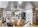 Modern kitchen featuring white cabinetry, stainless steel appliances, and beautiful countertops at 33844 Oriole Ct, Elizabeth, CO 80107