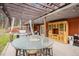 Outdoor patio area with dining table, grill, and built-in buffet at 33844 Oriole Ct, Elizabeth, CO 80107