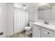Clean, updated bathroom with shower, vanity, toilet, and modern fixtures at 6336 W 71St Pl, Arvada, CO 80003
