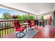 A cozy deck with a table, chairs and bar seating, perfect for enjoying the view and outdoor living at 6336 W 71St Pl, Arvada, CO 80003