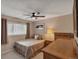 Bedroom featuring neutral tones and ceiling fan, providing comfort at 1540 Fawnwood Rd, Monument, CO 80132