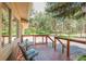 Charming deck with seating area and neighborhood views at 1540 Fawnwood Rd, Monument, CO 80132