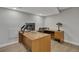 This office features modern desks and wood floors at 1540 Fawnwood Rd, Monument, CO 80132