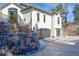 Attached three-car garage with stone retaining wall at 9465 E Orchard Dr, Greenwood Village, CO 80111