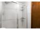 The shower of a white tiled bath at 1604 Lisbon Dr, Parker, CO 80138