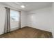 Bright bedroom features neutral colored carpet, white walls and a double door closet at 1604 Lisbon Dr, Parker, CO 80138