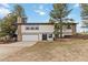 Charming two-story home with a two-car garage and stone accents at 1604 Lisbon Dr, Parker, CO 80138
