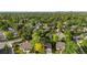 Aerial view showcasing a neighborhood with mature trees and well-maintained homes at 3235 E Easter Pl, Centennial, CO 80122