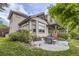 Stunning outdoor patio with elegant seating and landscaping, perfect for entertaining or relaxing at 714 Skywalker Pt, Lafayette, CO 80026