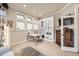 Bright office features a built-in bookcase, large windows and room to work from home at 714 Skywalker Pt, Lafayette, CO 80026