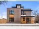 Modern two-story home with brick exterior and wood accents at 4339 W 33Rd Ave, Denver, CO 80212