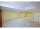 Spacious finished basement featuring neutral paint, carpet, and recessed lighting at 7140 S Uinta St, Centennial, CO 80112