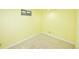 Neutral finished basement room with one window and carpet at 7140 S Uinta St, Centennial, CO 80112
